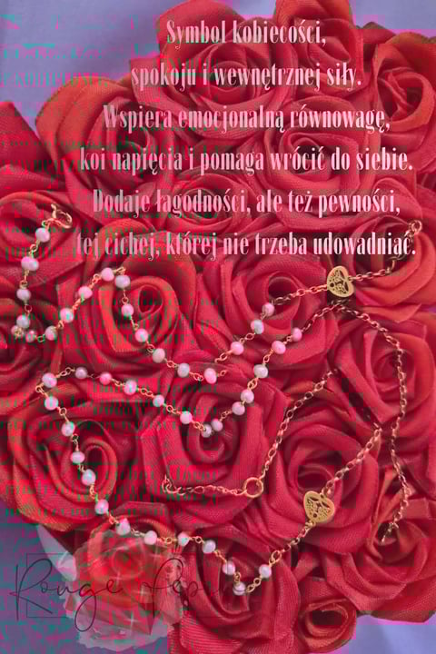 Red roses with pearl and gold beaded necklaces with Polish text about womens strength